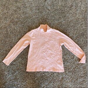 Pink turtleneck